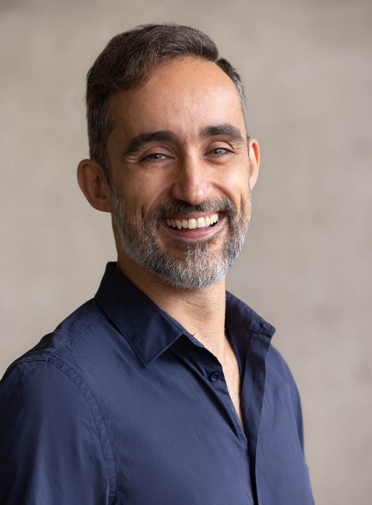 Headshot of a Caucasian male looking into the camera smiling.