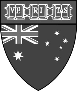 Grey and white version of the Harvard shield with the word VERITAS at the top and the Australian flag below. 