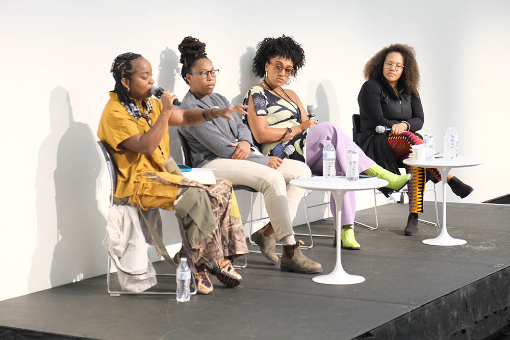 A group of people on stage at the Black in Design 2023 conference.