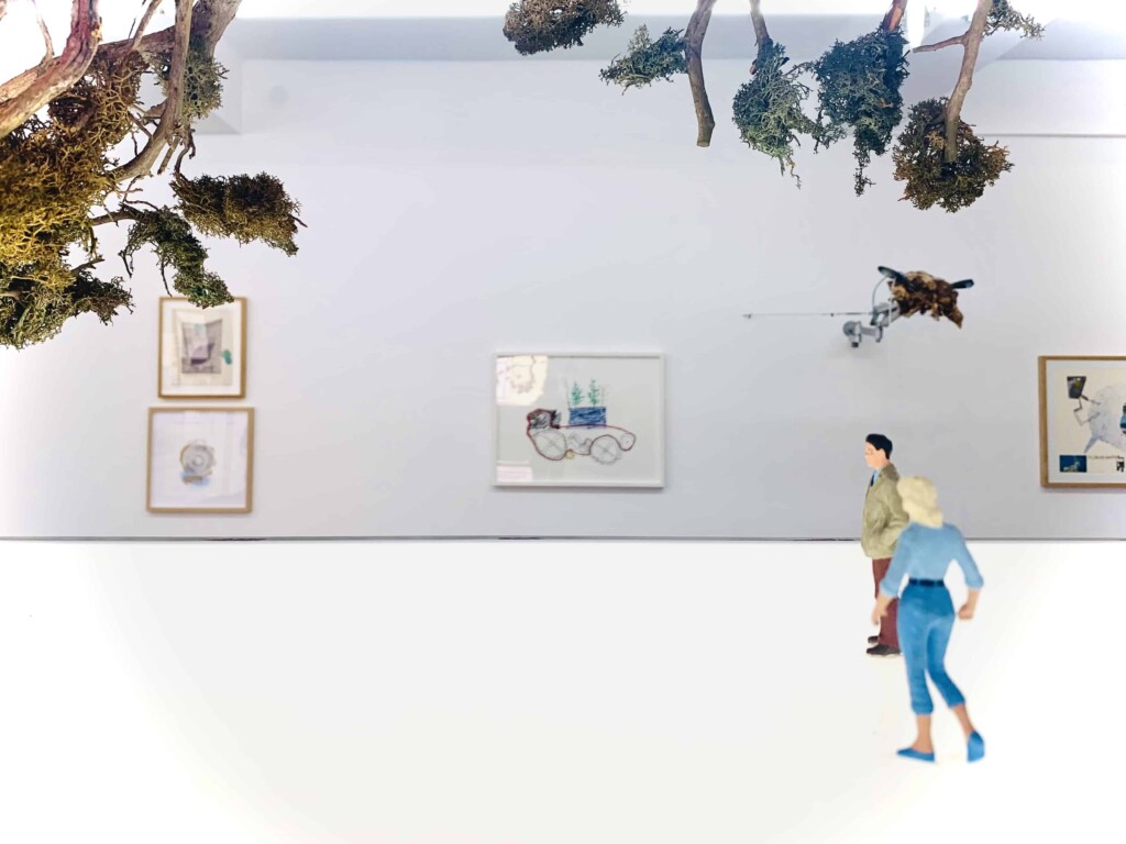 Cartoon-like human figures walking through an art gallery with tree branches overhead.