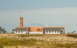 A rendering of a building with a radio tower.