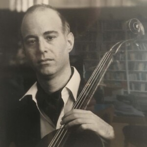 Black and White Photograph of Richard Sennett playing the cello
