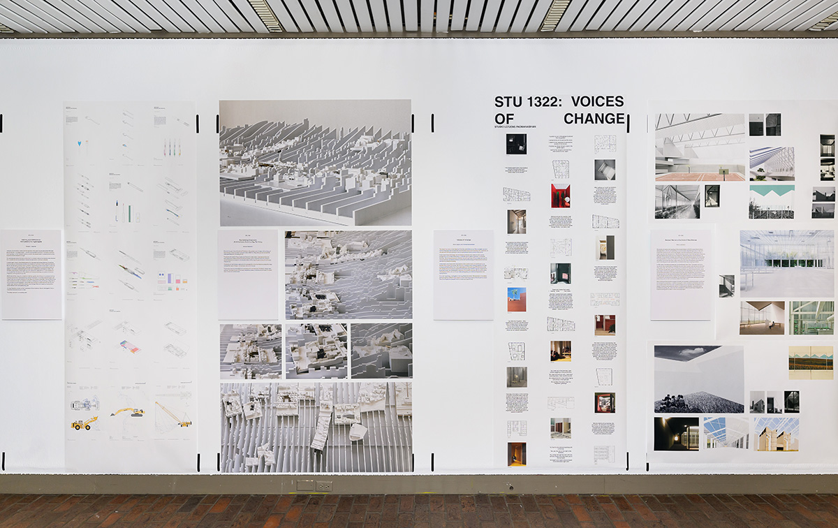 A detail of the exhibit in Druker Design Gallery, showing a variety of different images on the wall.