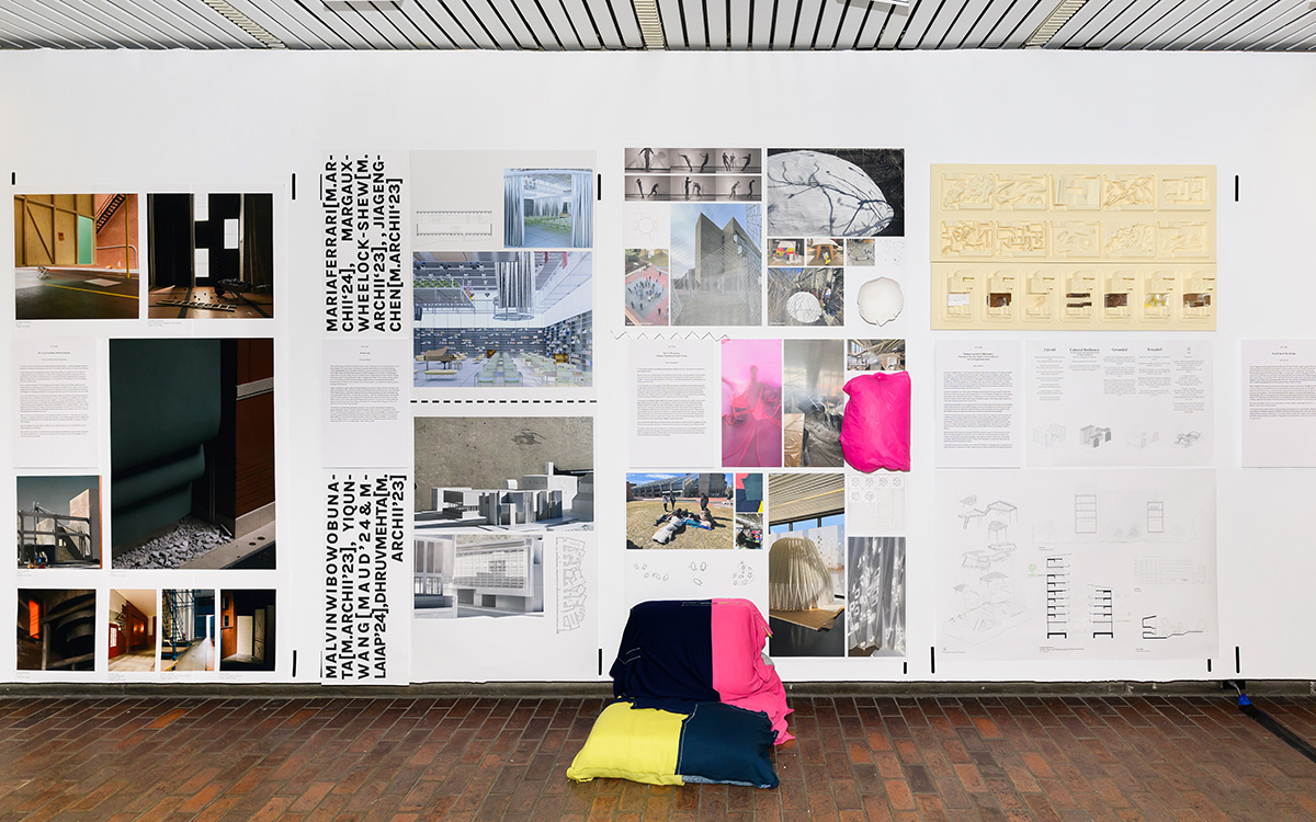 A detail of the exhibit in Druker Design Gallery, showing a variety of different images on the wall.