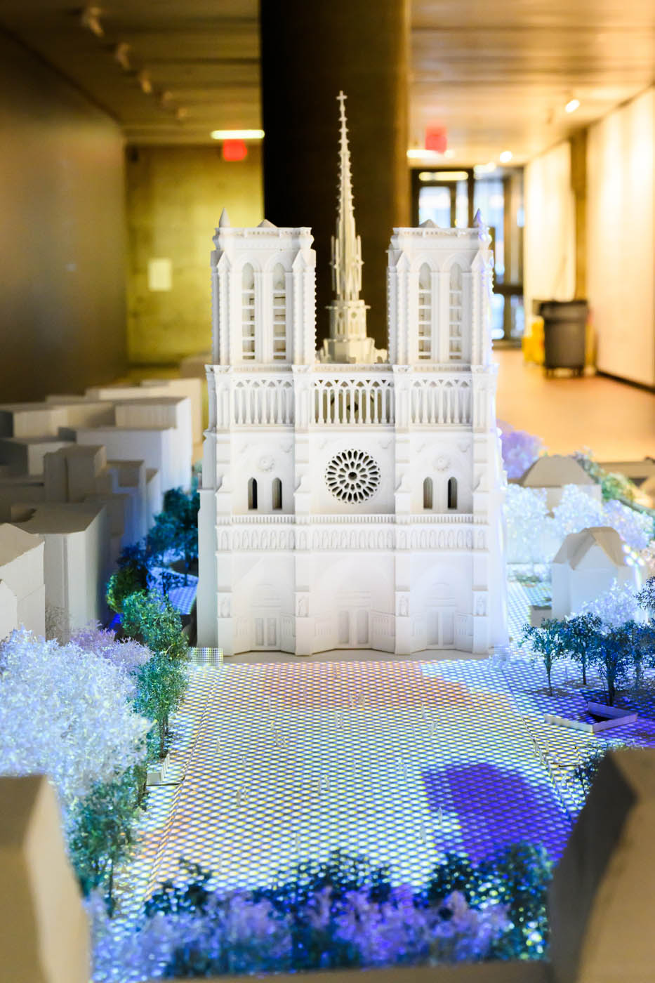 A model of the Notra Dame cathedral with a projection on the landscape.