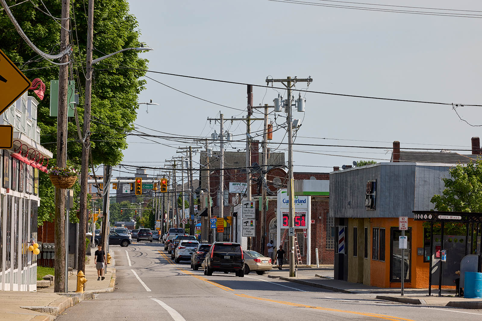 Photo showing a street with small businesses in Central Falls, RI