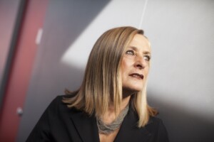 Headshot of Giuliana Bruno against a gray backdrop