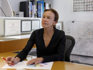 Photo of Signe Nielsen working in her office.