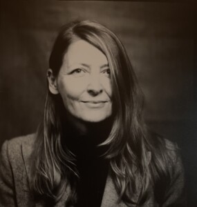 Sepia toned headshot of Stephanie Hankey