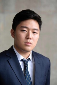 headshot of Ace Kang