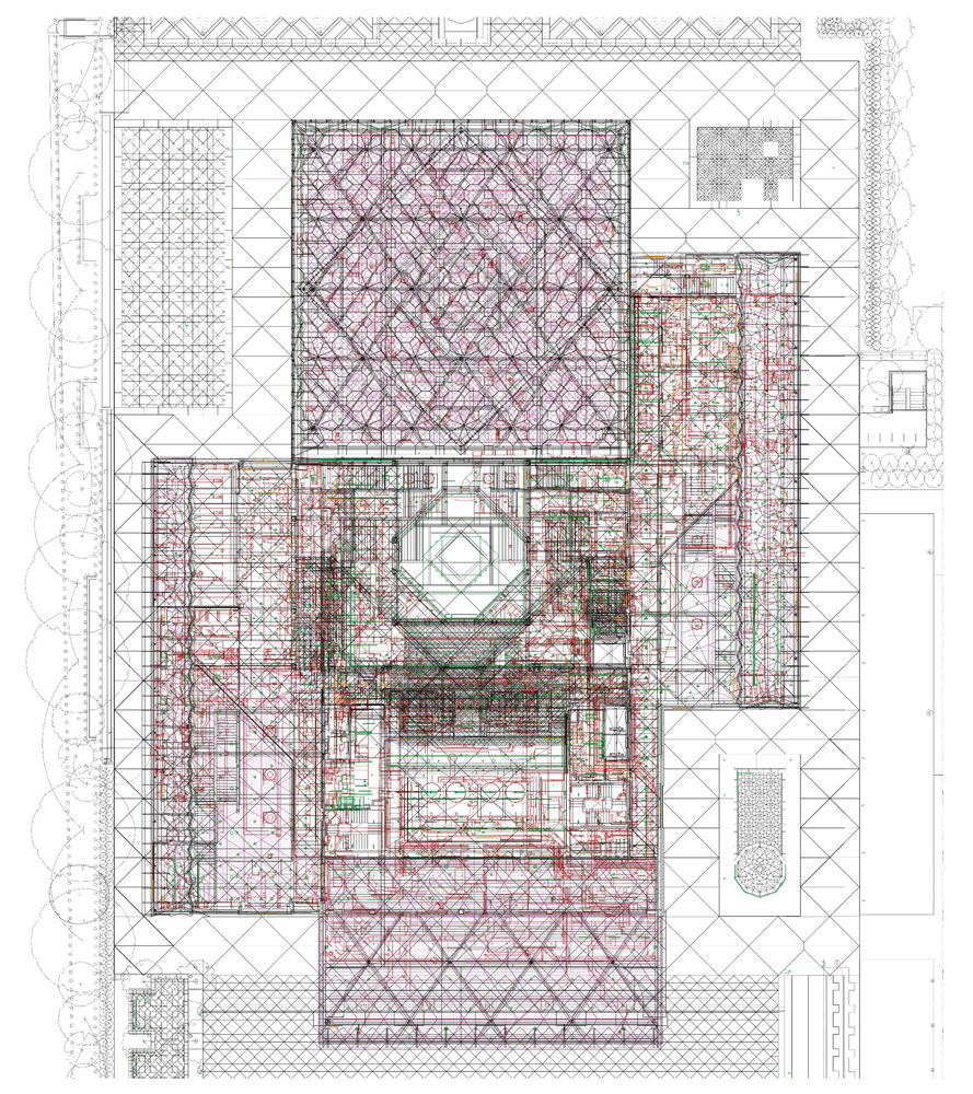 An architectural drawing showing the plan for a religious community center building with lines and markings in many colors indicating various building systems.
