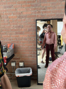 A photograph showing Stacey Berman at a costume fitting for "A Different Man."