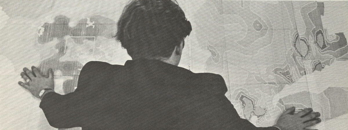 man holding up computer generated map