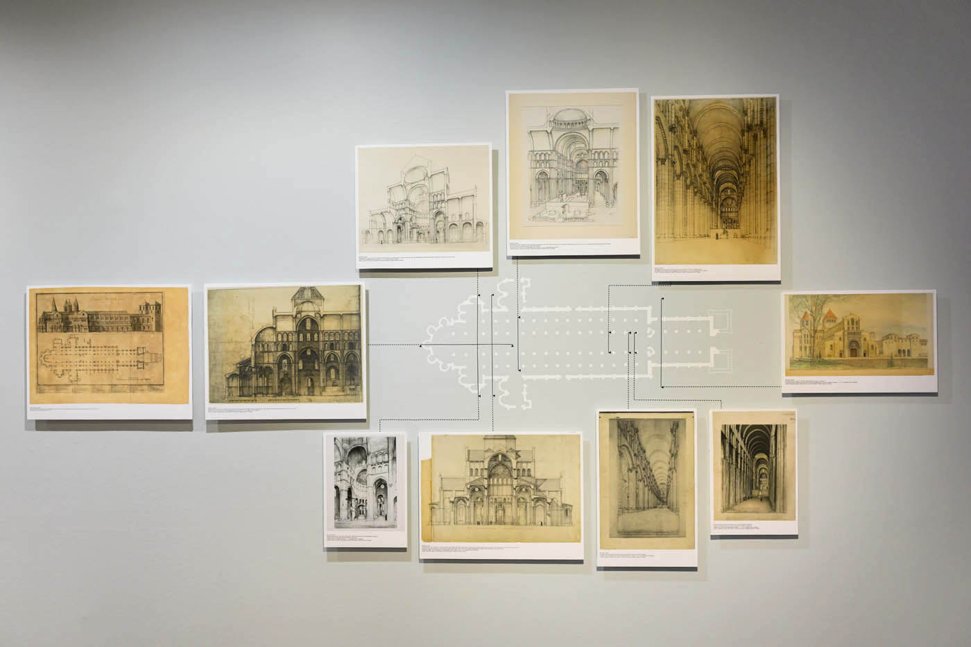 A plan of a church with images around it. Lines on the plan signal the locations and views of from which the interior images of the church were drawn from.
