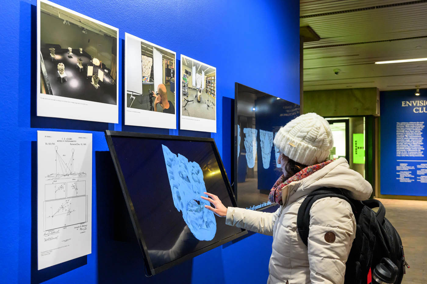 A person interacting with a touch-screen.