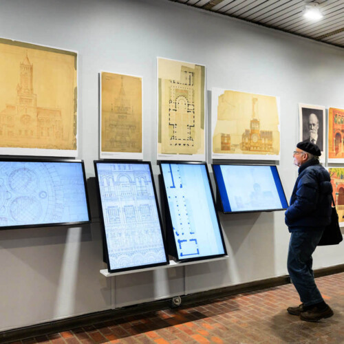A person interacting with a touch-screen.