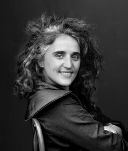 Black and white headshot of Chelina Odbert