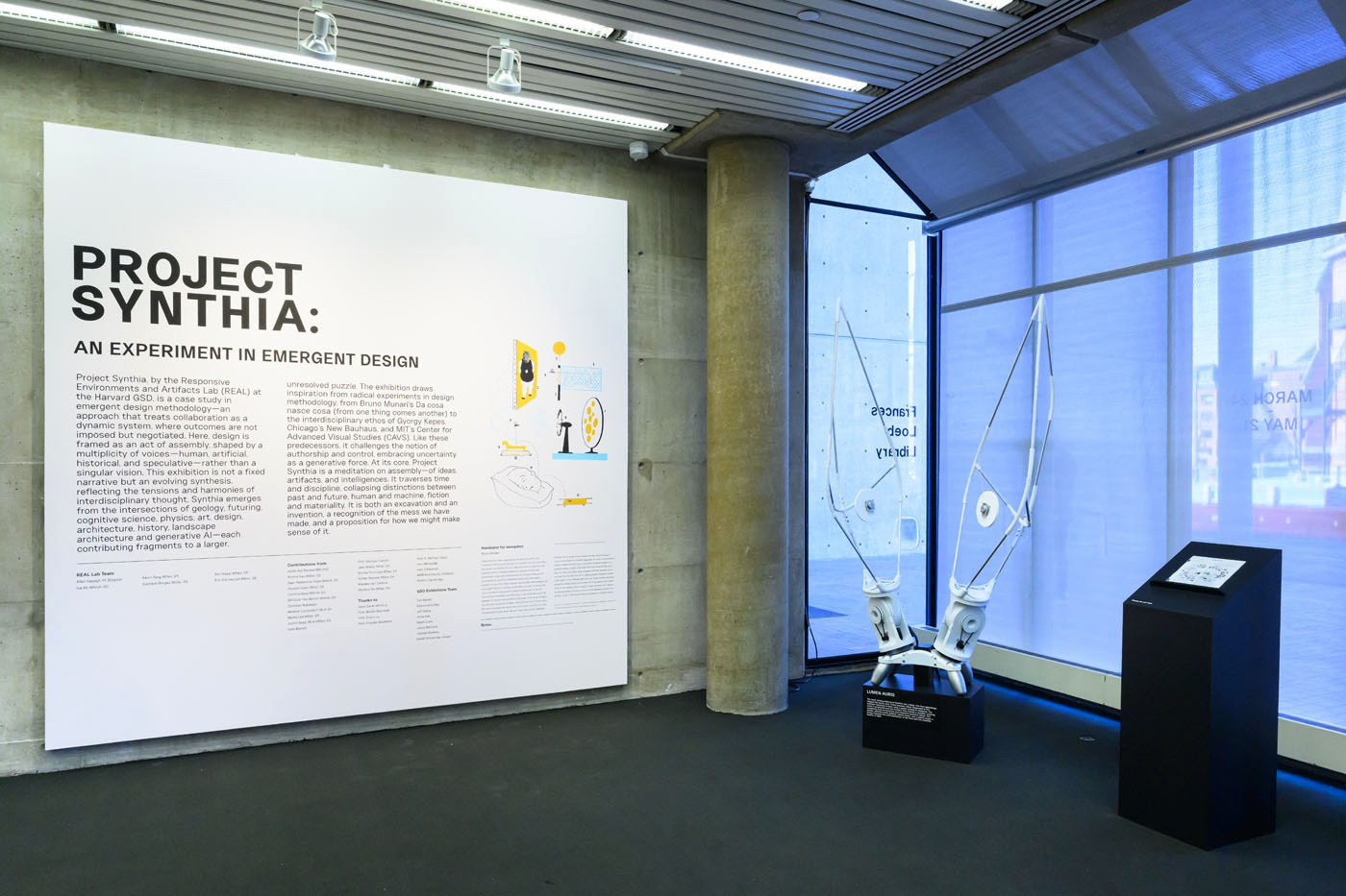Introduction, rabbit eared model, and a pedestal with a small pamphlet