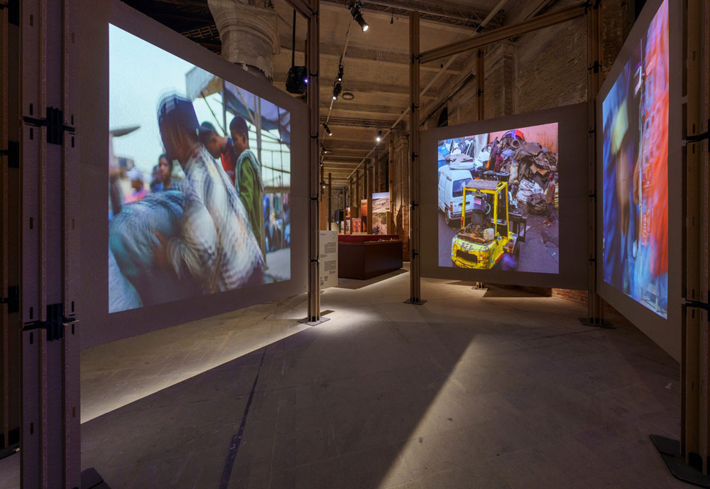large screens with city images