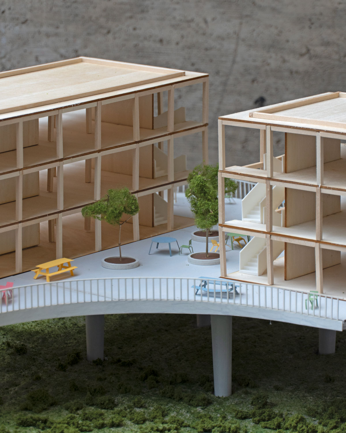 A photograph of a model showing a housing complex.