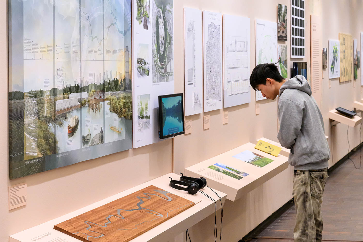 A person studying a display of the Turkey Bend Project.