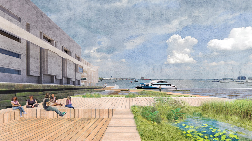 View looking from wooden platform and wetlands next to concrete building out to sea and islands beyond.