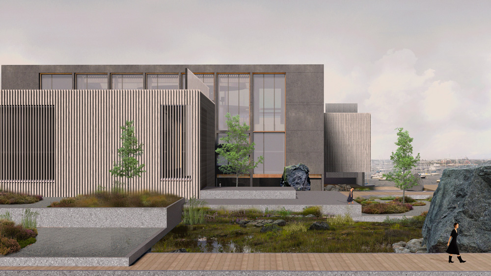 Detail of buildings overlooking water with wetlands, wooden walkways, and stone plinths.