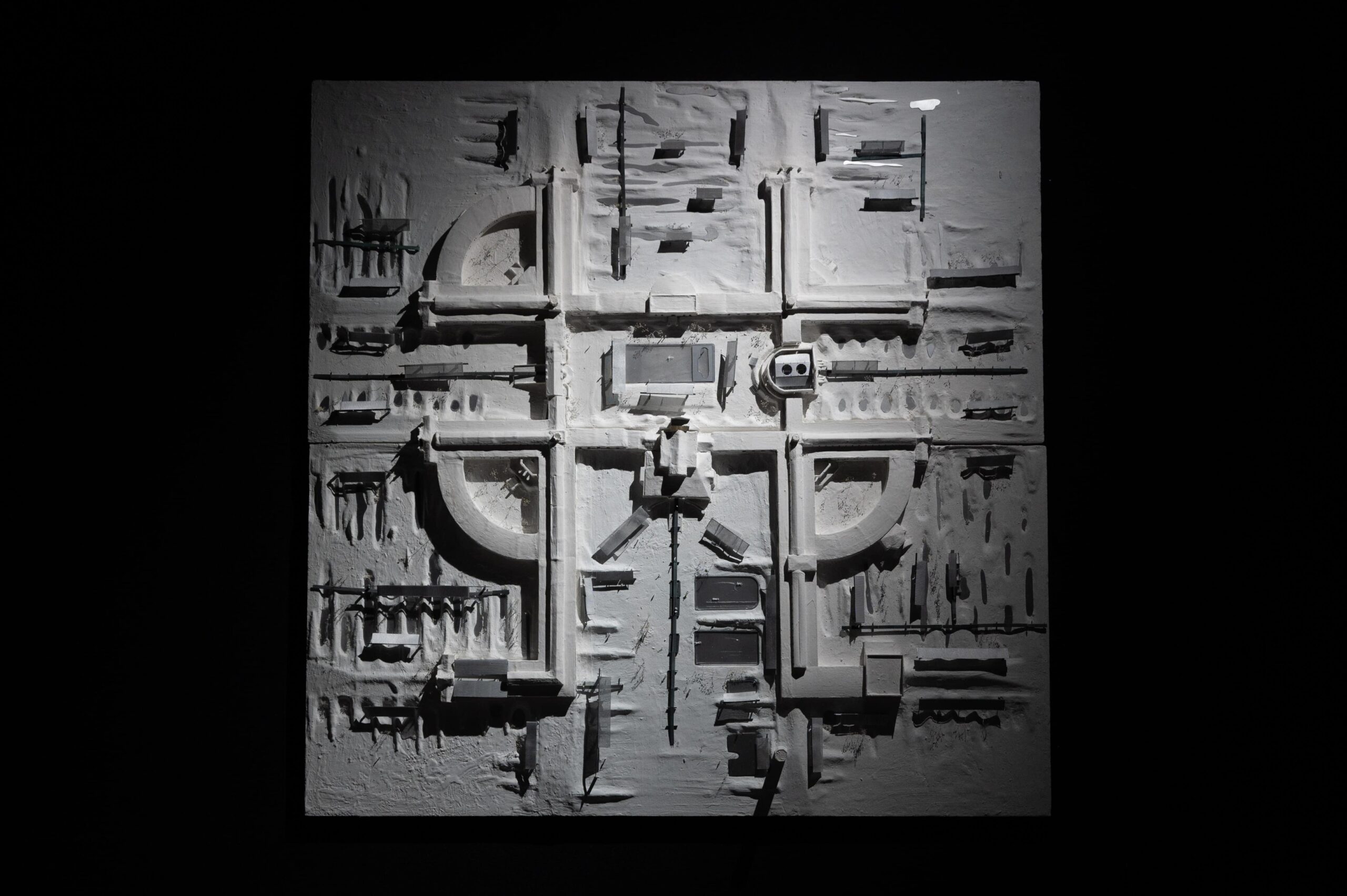 Model of a flat surface with raised sections