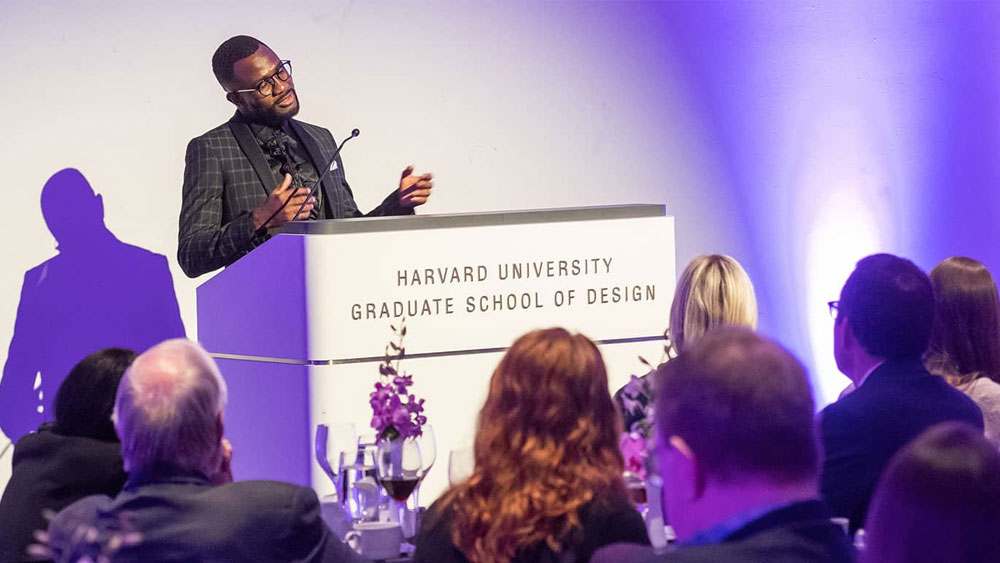 Donors listening to a speaker at a fellowship event.