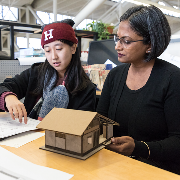 Student and faculty member during a desk critique.
