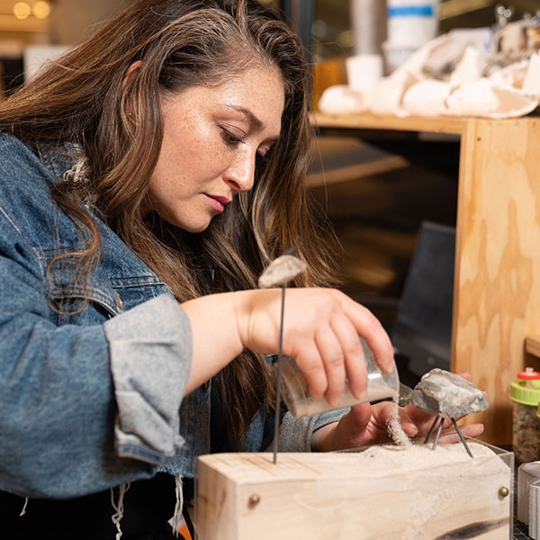 Felicia Perez working in studio.