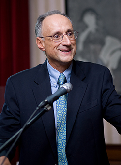 Photo of Nic Retsinas speaking at podium