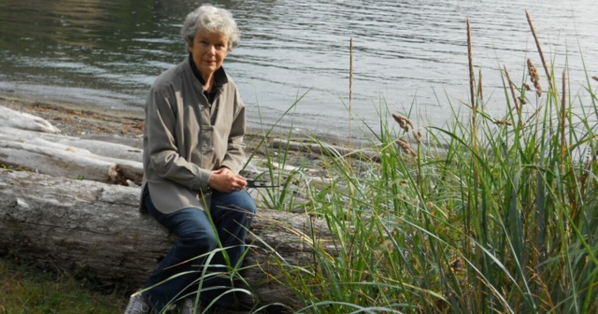 Dorothy Trogdon sits by water