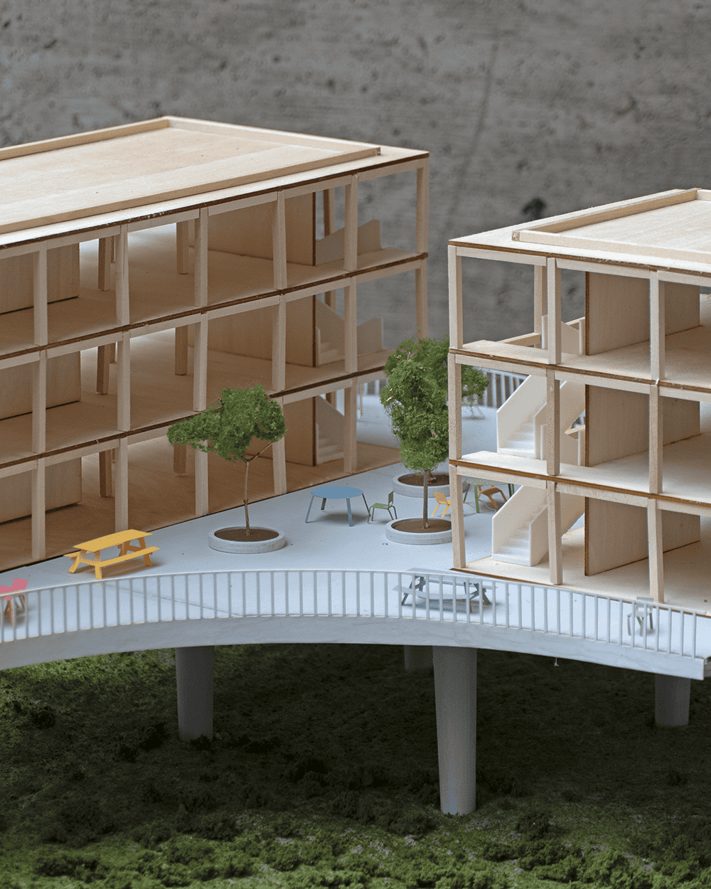 Rendering of two buildings separated by open space
