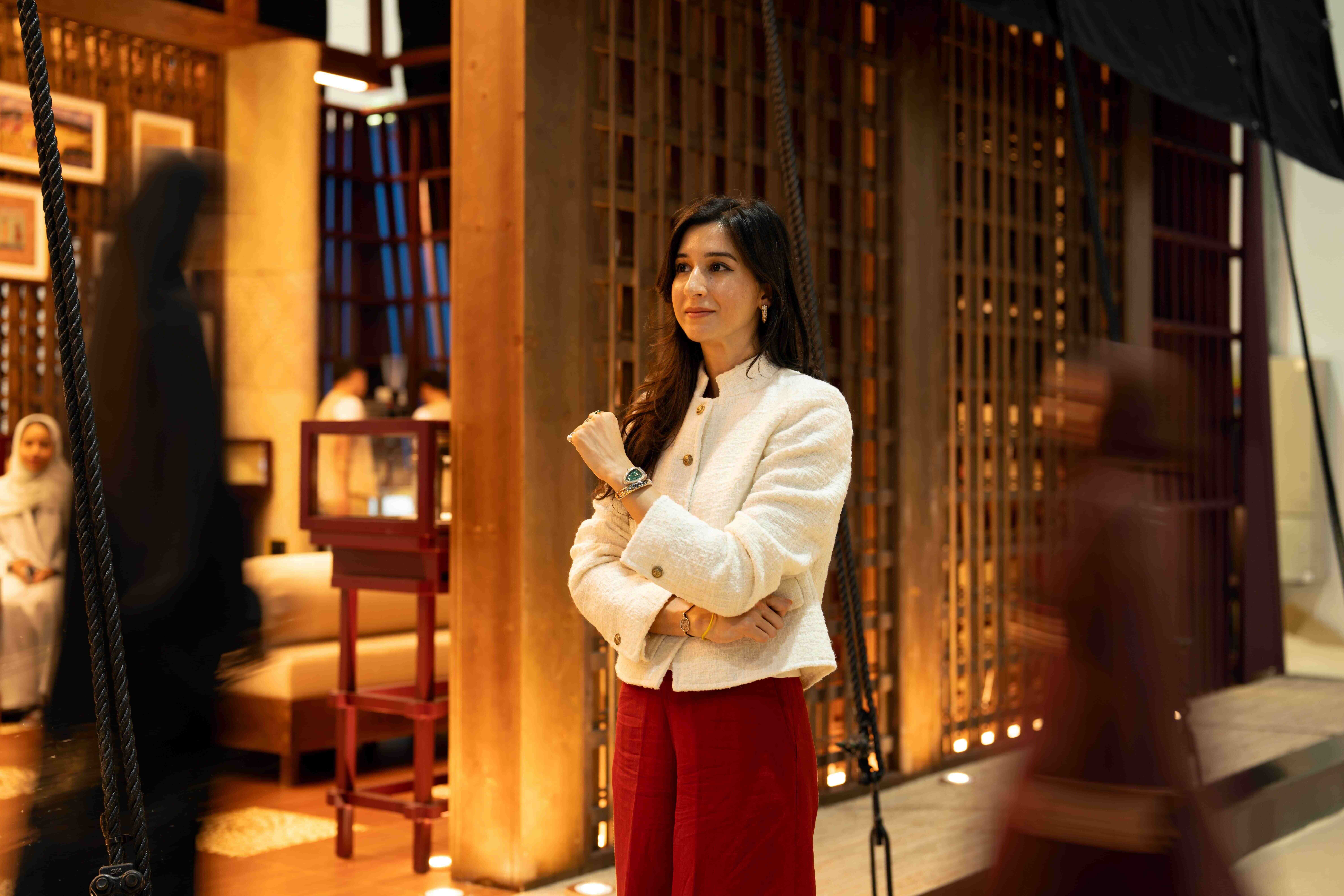 Oorvi Sharma stands in the pavilion she designed