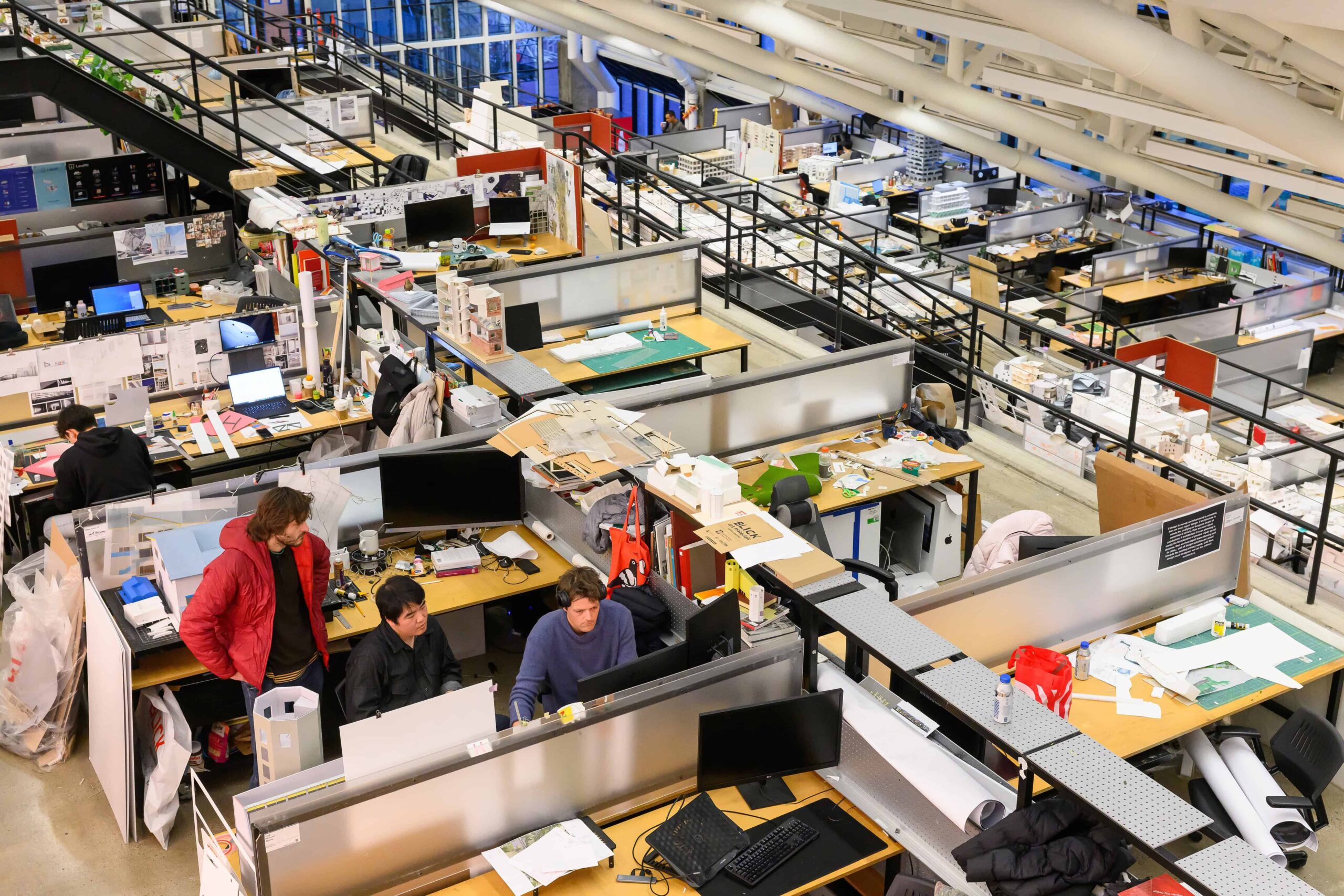 Ariel view of the trays in Gund Hall with a few students working