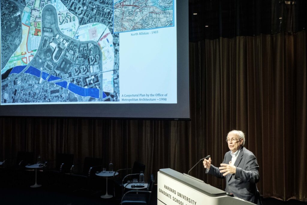 Alex Krieger in front of a proposed map of Allston, MA