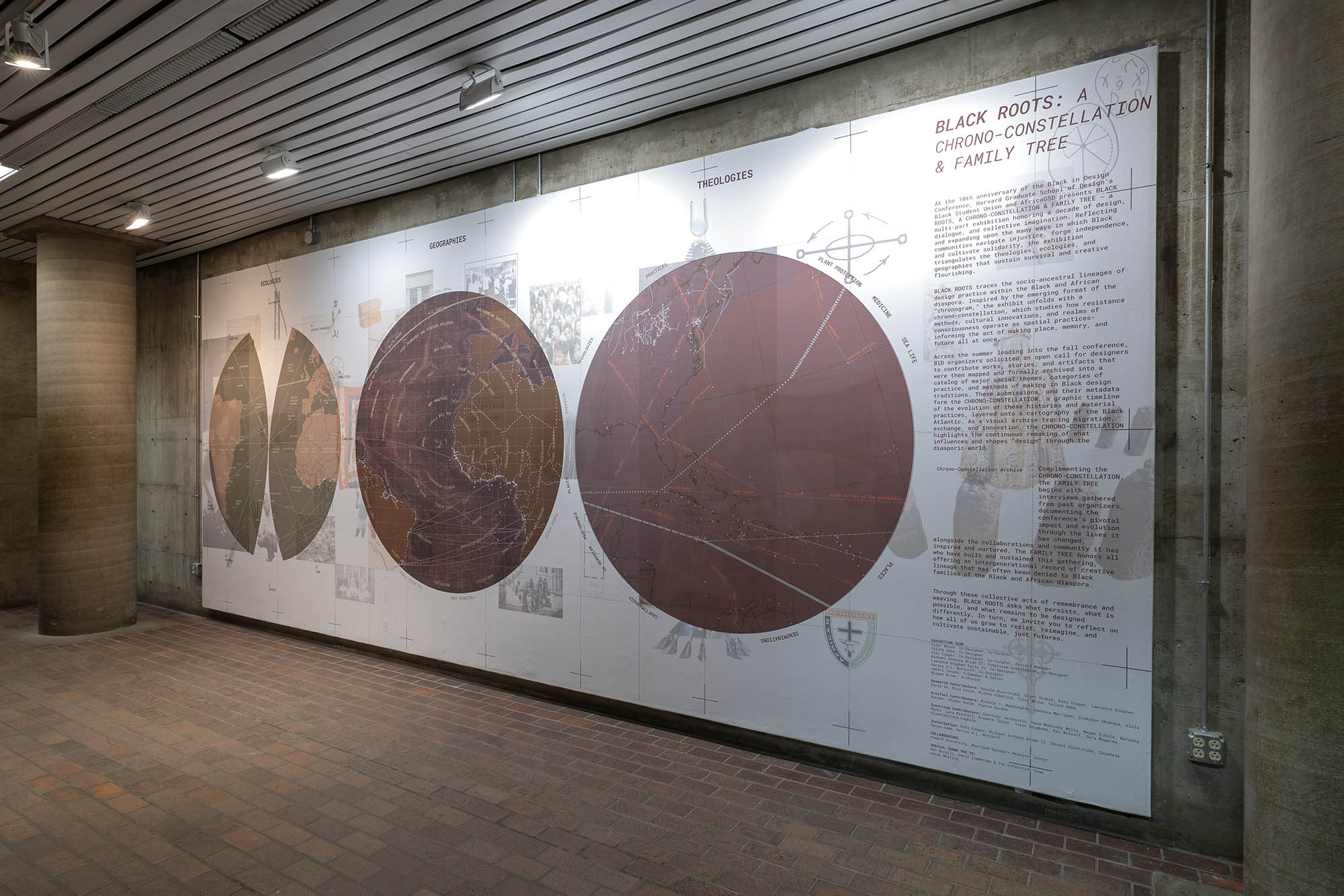 A Wall with three large circular maps and