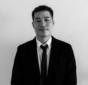 Grayscale headshot of Ken Congsuwat