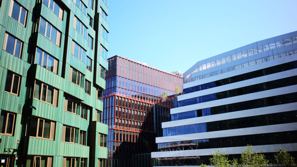 Green, red, and white buildings overlapping