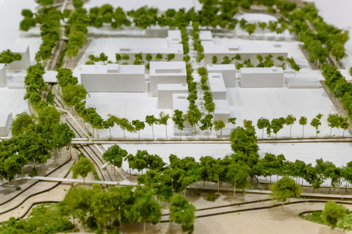 Detail of a landscape architectural model with roadways and trees.