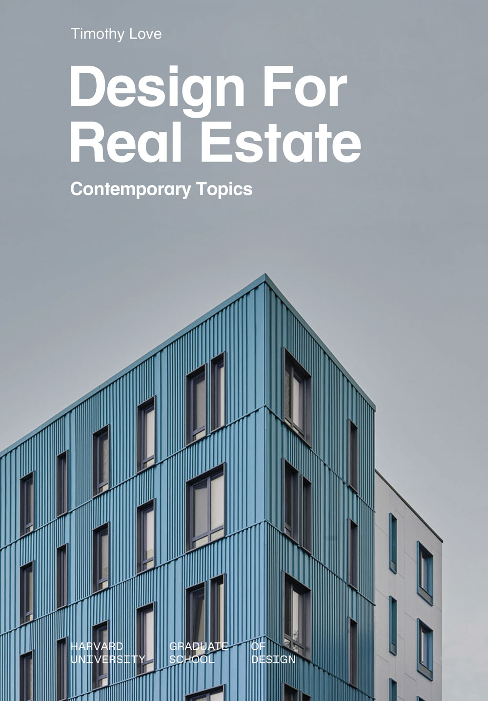 Cover of "Design For Real Estate: Contemporary Topics" by Timothy Love. Features a modern blue building against a gray sky, conveying a sleek, urban feel.