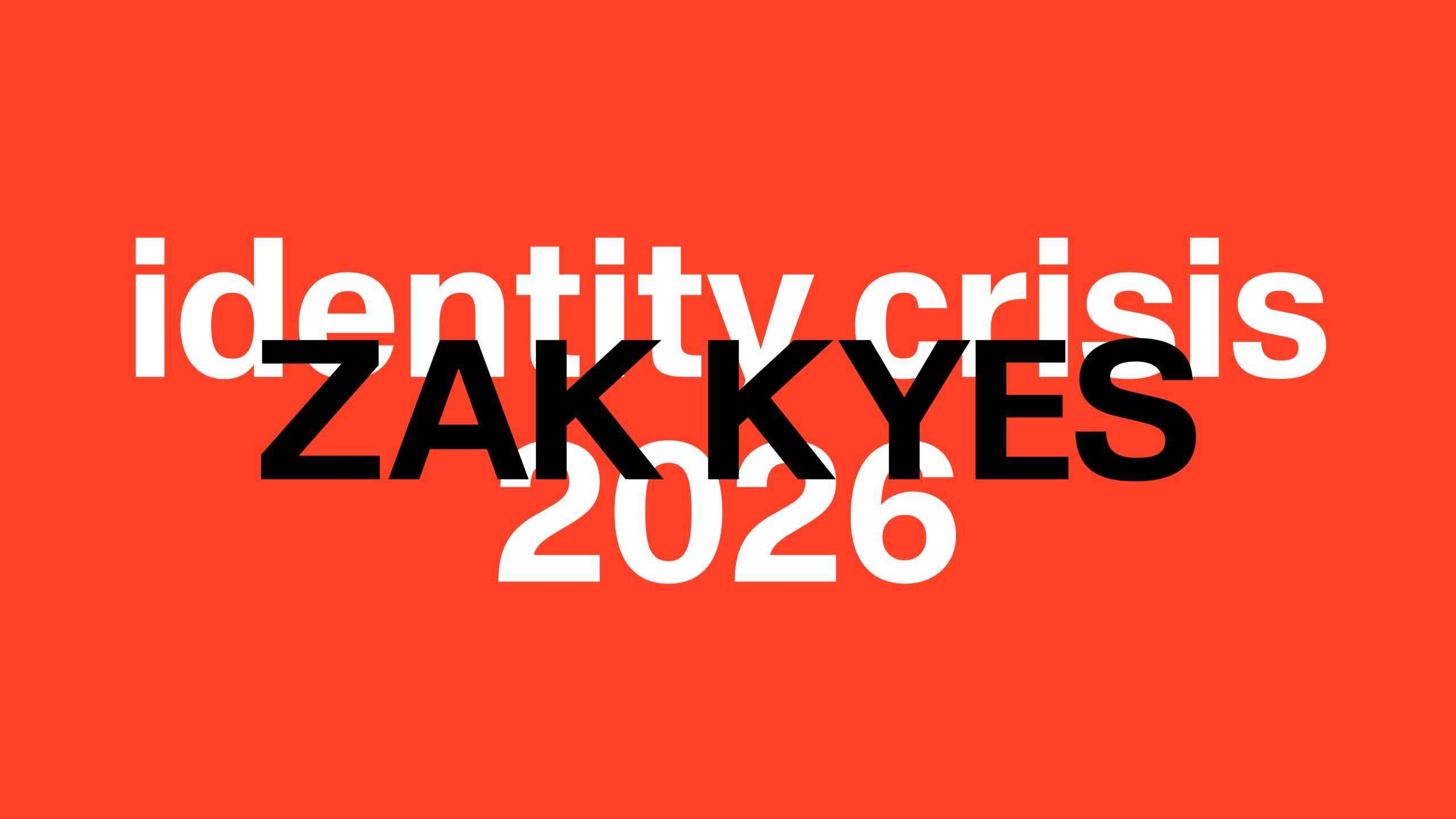 Red background with "Zak Kyes" in black text, overlaid on "identity crisis 2026" in white