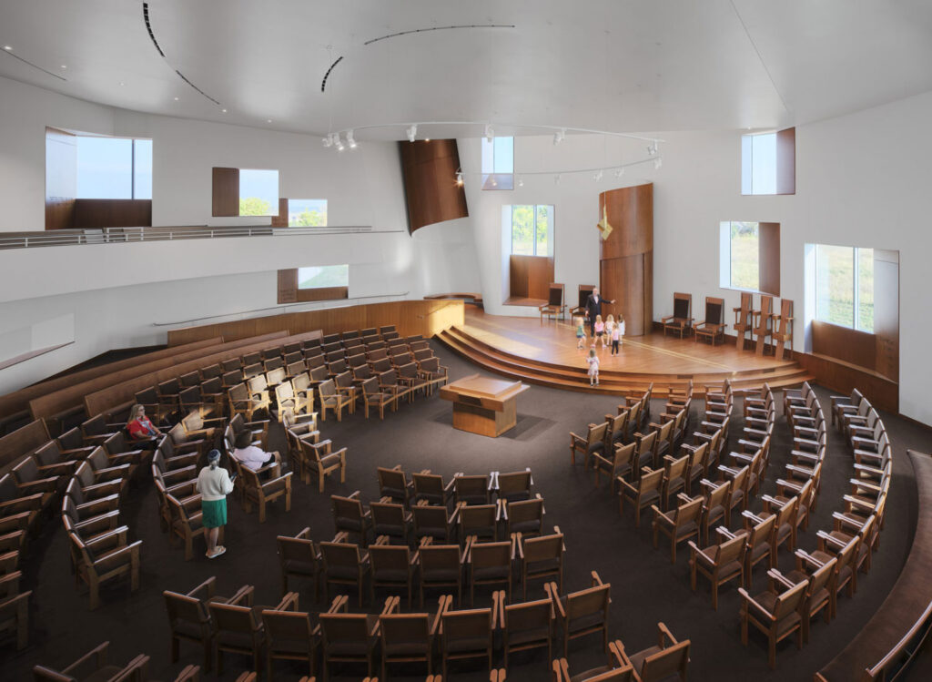 View into chapel with chairs, benches, and balconies