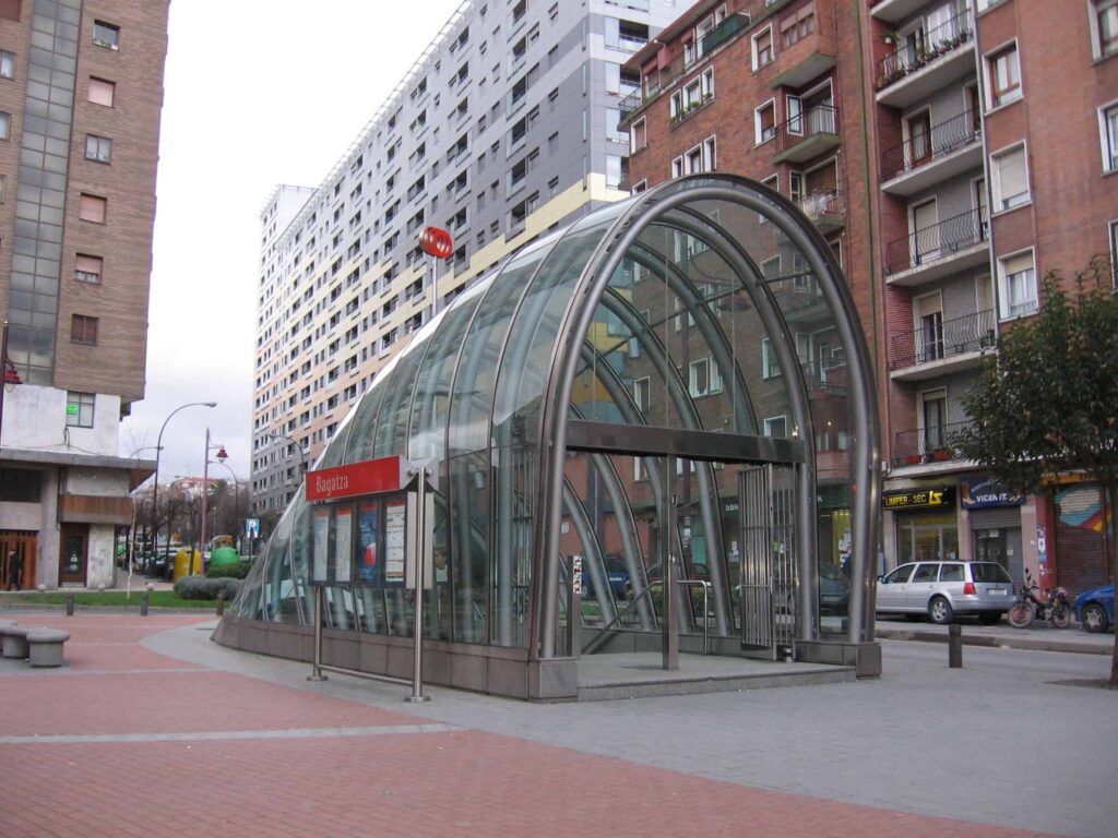 Glass entrance to Bagatza metro station. "Metro bilbao bagatza" by Ardo Beltz 15:32, 22 January 2006 (UTC) is licensed under CC BY-SA 3.0.