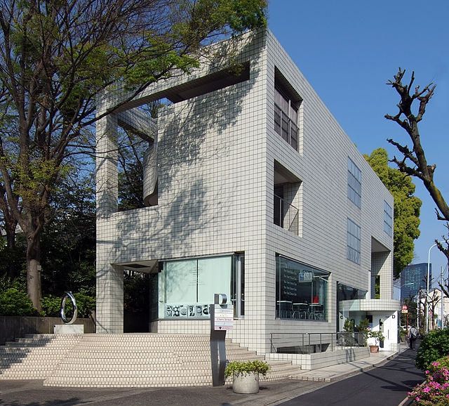 Exterior of Hillside Terrace complex building, with steps leading up to it and a sidewalk on the right. "Hillside Terrace D 2010" by Wiiii is licensed under CC BY 3.0.