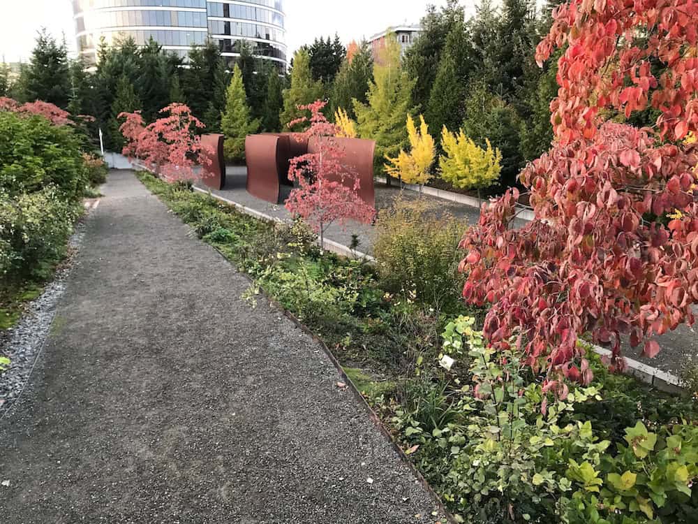 Zigzag pathway with a sculpture in the middle. "Olympic Sculpture Park in Fall 1" by Cedar777 is licensed under CC BY-SA 4.0.