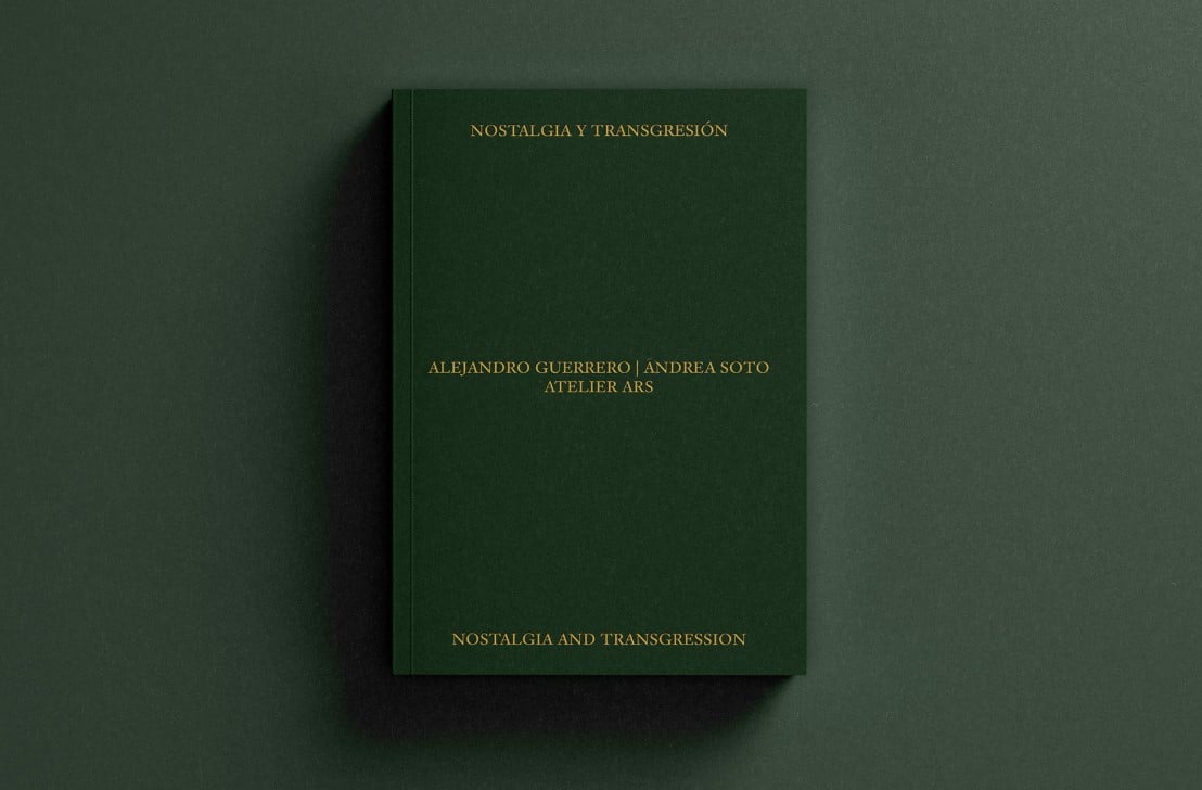 A green book sits atop a green background