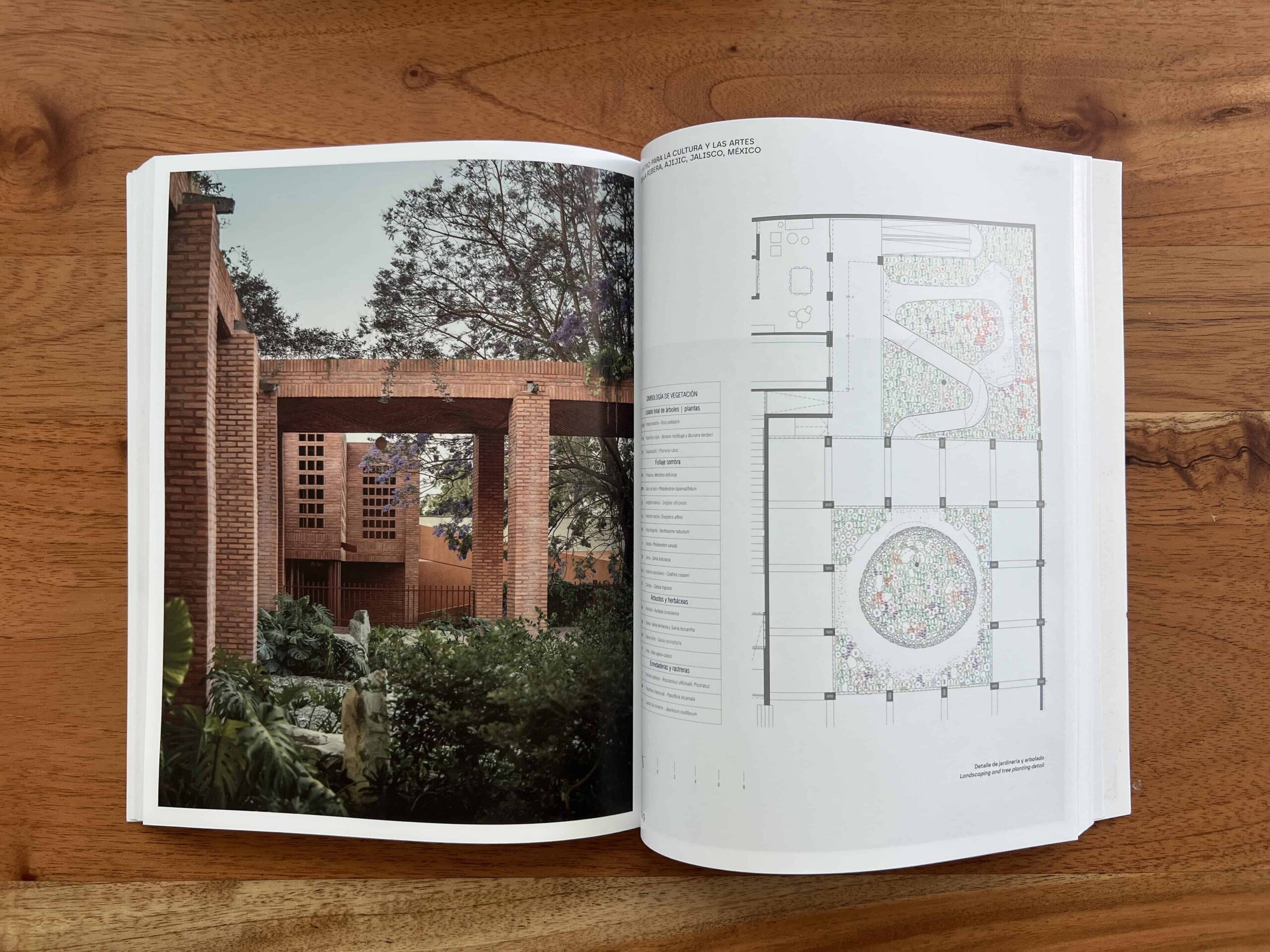 Open book showing a photograph of a project on the left side and a blue print on the right side