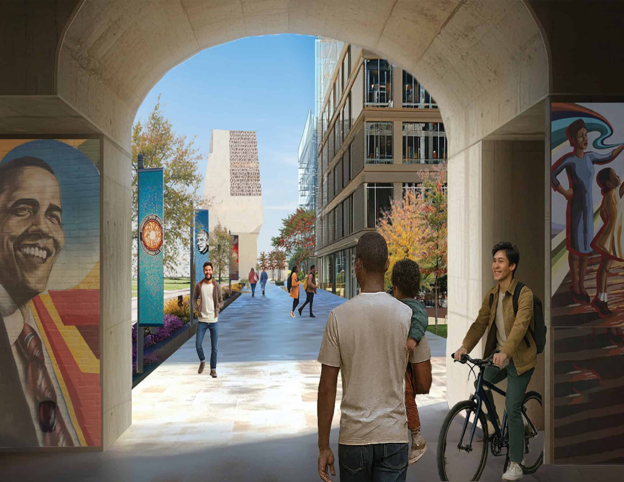 A vibrant street scene with people walking and biking under an archway. On the left, a mural features a portrait of Barack Obama. The pathway leads to a modern building surrounded by autumn trees.